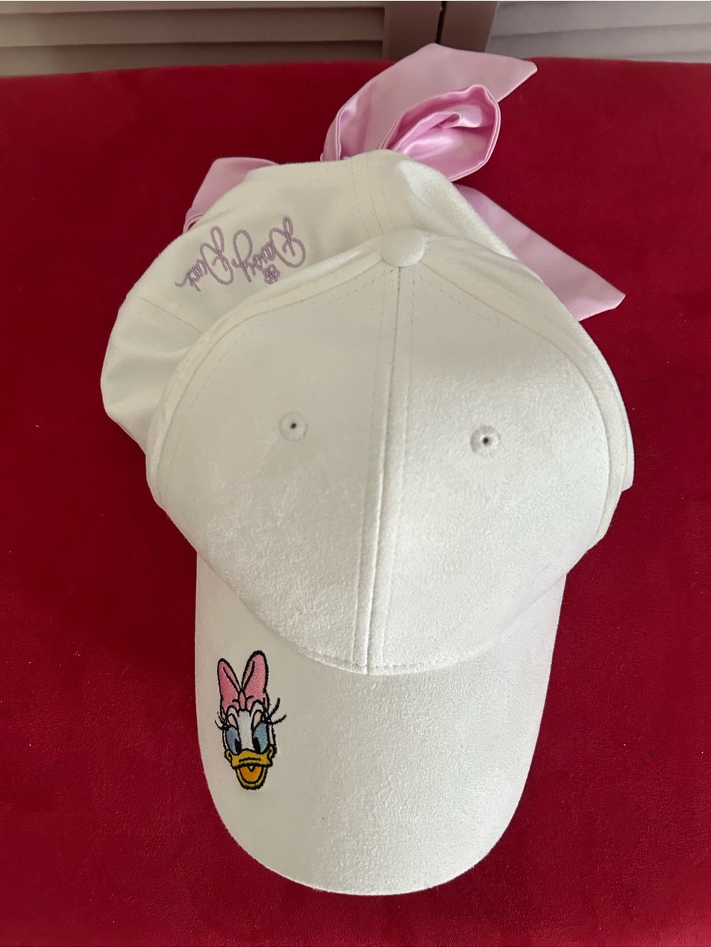 Disney Cakeworthy White Daisy Duck Baseball Cap with Pink Bow